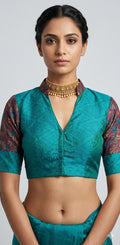 Peacock green silk blouse