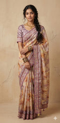 Tissue kotta saree with kutch work border and stitched blouse