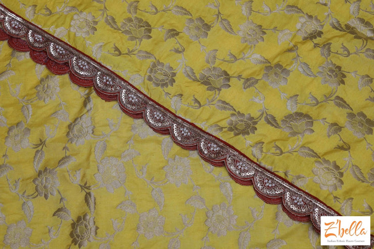 Yellow Banarsi Jaal Weave With Red Embroidery Border Stitched Blouse Saree