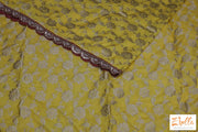 Yellow Banarsi Jaal Weave With Red Embroidery Border Stitched Blouse Saree