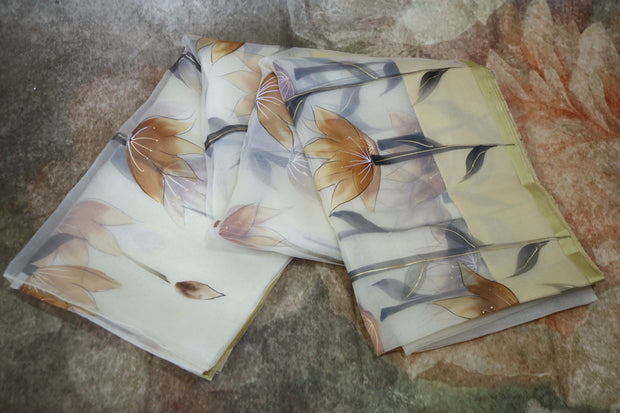 Hand painted off white  organza saree
