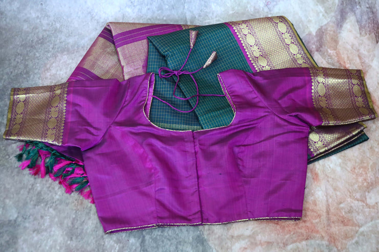 Bottle green kanchipuram silk hand woven saree with wine red border , stitched blouse