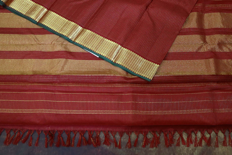 Maroon kanchipuram silk hand woven saree with stitched blouse