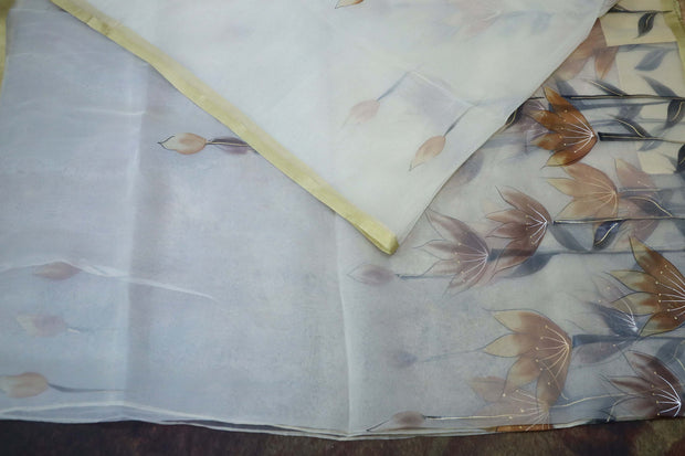 Hand painted off white  organza saree