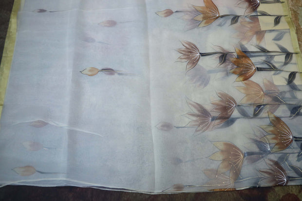 Hand painted off white  organza saree